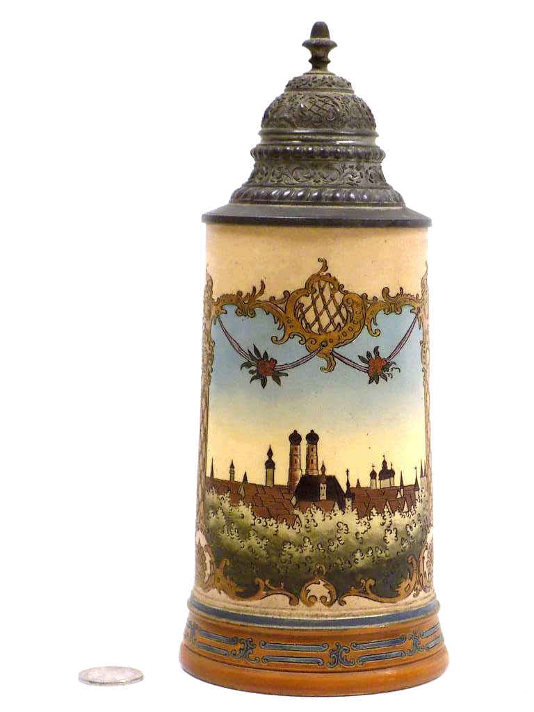HB HAUBNER REUTHER MUNICH SCENE No 423 BEER STEIN: HB Haubner & Reuther Pottery Beer Stein. No. 423 Incised Scene of Munich Germany. Fancy Pewter Lid, Scrollwork and Figural Crest. 1/2 Liter. Height 9.50" Signed, Numbered Base