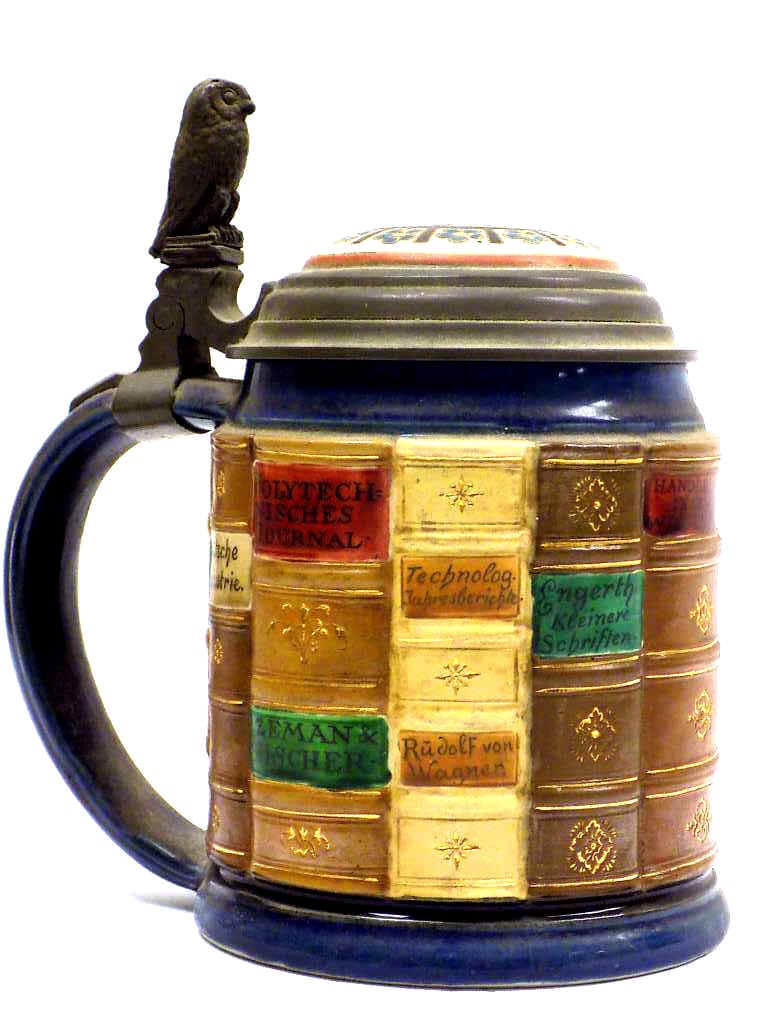 METTLACH STEIN No 2001 BOOK SPINES MATHEMATICIANS: Mettlach Pottery Beer Stein No. 2001. Entitled Book Spines For Mathematicians. Surrounding Etched Gilt Leatherbound Math Books. Rare Floral Variant Lid Pewter Owl Finial. Design Attributed to O. Hupp.