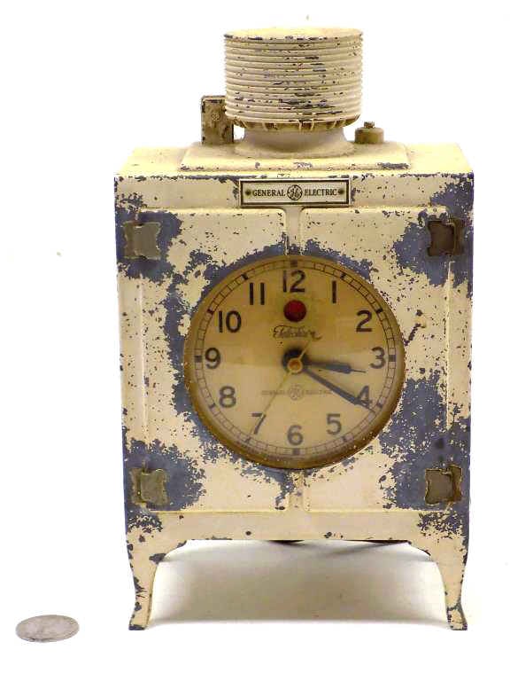 GENERAL ELECTRIC MONITOR TOP REFRIGERATOR CLOCK: Vintage 1930's General Electric Promotional Advertising Clock in the Form of a Monitor Top Refrigerator. To Promote This Appliance. Warren Telechron Co. Movement. Original Paint. Approximately 9" Tall