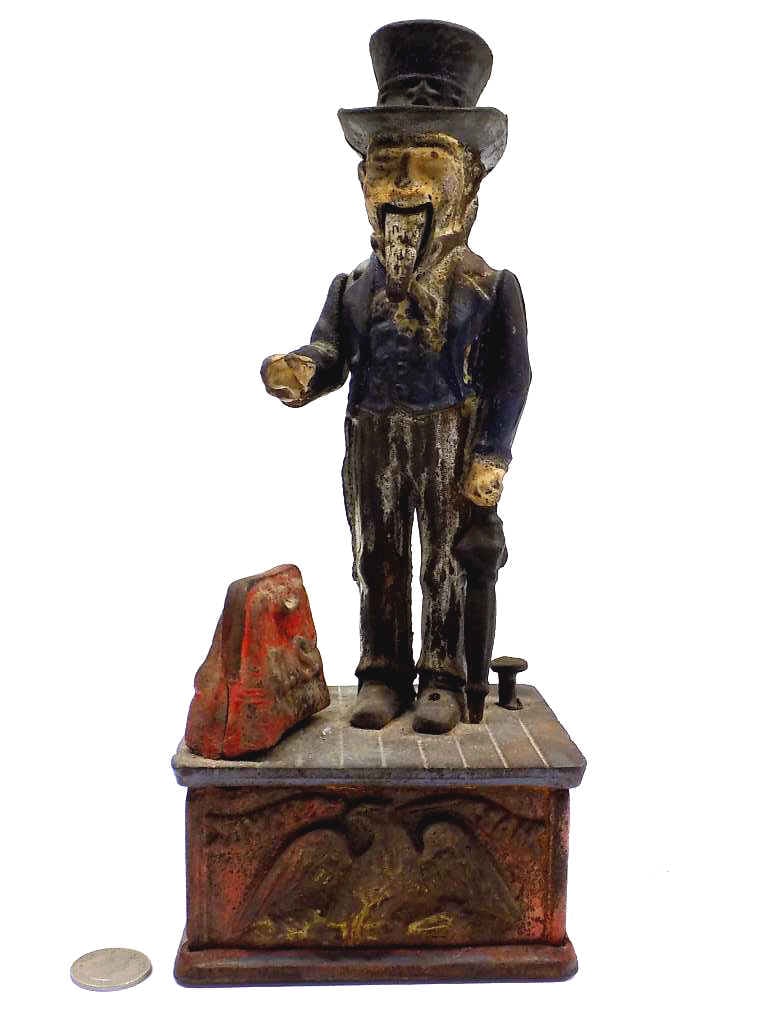 UNCLE SAM CAST IRON TOY BANK: Uncle Sam Cast Iron Toy Bank. Original Paint. Approximate Height 11.25" Working Order.