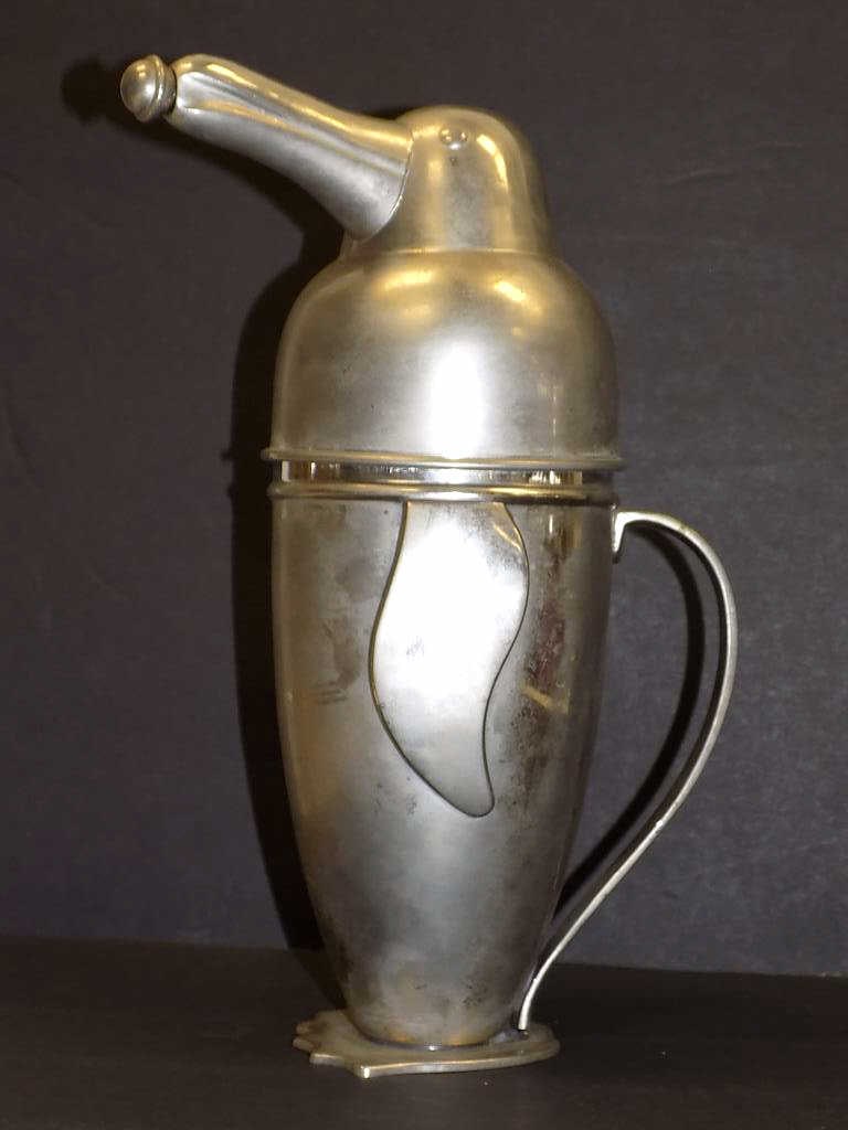 MODERNIST PENGUIN COCKTAIL SHAKER: Modernist Penguin Cocktail Shaker. Silver plated. Height 11.25" x Diameter 8"