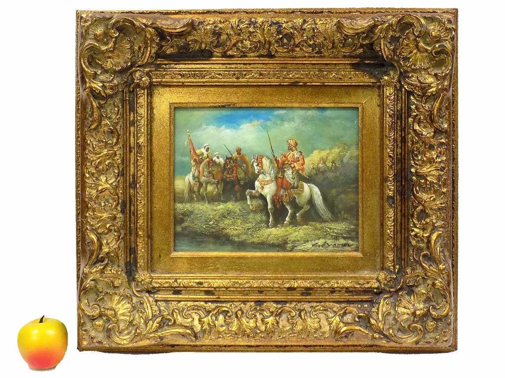 KRAMER - ARABIAN SOLDIERS ON HORSEBACK PAINTING: Kramer - American 20th Century - Detailed Painting of Arabian Soldiers on Horseback. Oil on Panel. Signed Lower Right. 17.50" x 19.50" Elaborate Gold Gilt Frame Measurement.