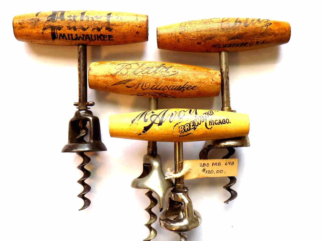 PABST SCHLITZ BLATZ BEER ADVERTISING CORKSCREWS: Rare Antique Advertising Wooden Corkscrews Group. Featuring Pabst Milwaukee, Schlitz Milwaukee, Blatz Milwaukee and McAvon Brewing Chicago. Helmet Form Bottle Grips. Handles 3 3/4". Old Patina. 4 Pcs