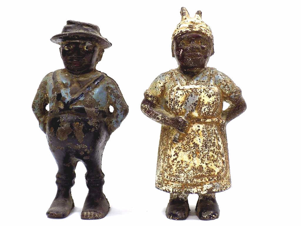 19TH CENTURY BLACK AMERICANA CAST IRON STILL BANKS: Pair of 19th Century Black Americana Cast Iron Toy Still Banks. African American Figures in Original Paint. Height 5.50" Original Paint.