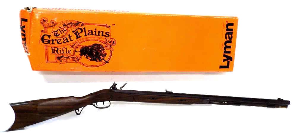 LYMAN GREAT PLAINS .50 CAL FLINT LOCK RIFLE LEFTY: Italian Lyman The Great Plains Rifle .50 Caliber Flint Lock Action Rifle. Serial A500827 Octagonal Barrel with Scrolled Engraved Hardware. Walnut Body. Appears unused in Original Box (Not assembled) R