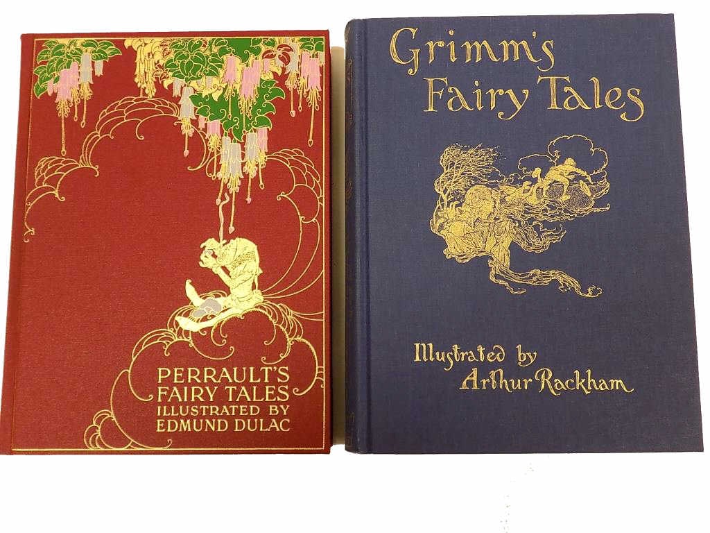 FOLIO SOCIETY GRIMMS & PERRAULTS FAIRY TALES BOOKS: The Folio Society Ltd Publishing London 2003 Grimm's Fairy Tales Illustrated by Arthur Rackham. Gilt Pictoral Full Blue Cloth Cover with Slipcase. Color Plates. Along with Perrault's Fairy Tales Illus