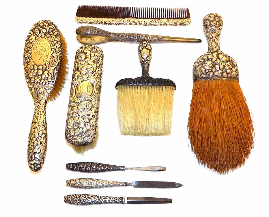 FANCY VICTORIAN REPOUSSE STERLING VANITY ITEMS: Assorted 19th Century Victorian Sterling Silver Vanity Items. Fancy Floral Repousse Designs. Gorgeous Pieces Made By George W. Shiebler and Gorham Silversmiths. Including: Hair Brush, Clothing Brush,