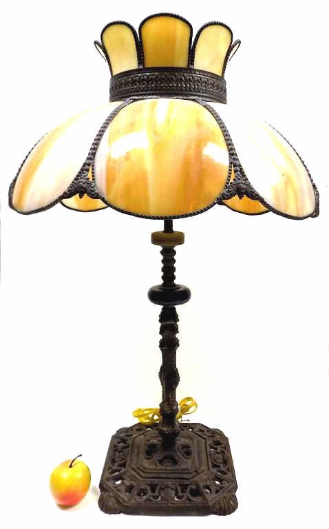 ART NOUVEAU IRON SLAG GLASS TABLE LAMP: Fancy Art Nouveau Slag Glass Table Lamp. 8 Panels. Ornate Cast Iron Base with Openwork and Shell Feet. Blue Lapis Column Inset. Height 29" Shade Diameter 18.50"