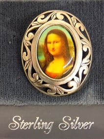 MONA LISA RETICULATED STERLING SILVER BROOCH
