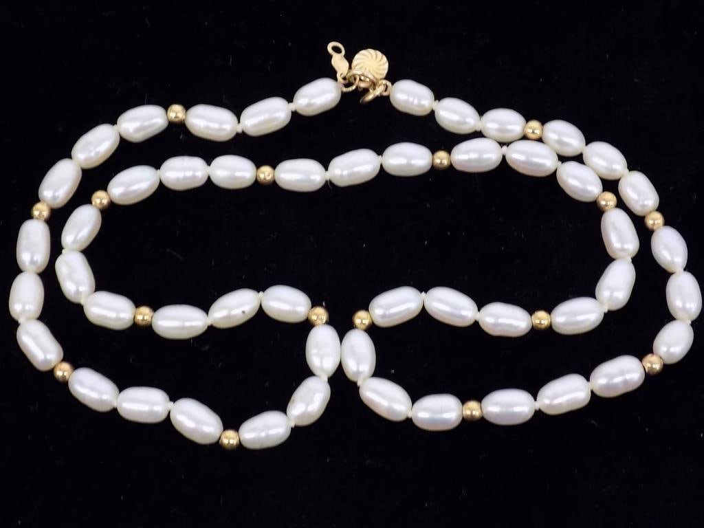 ELEGANT PEARL NECKLACE WITH 10K GOLD: Elegant Pearl Necklace with 10k Gold Beads and Clasp Marked Thorpe. Length 17"