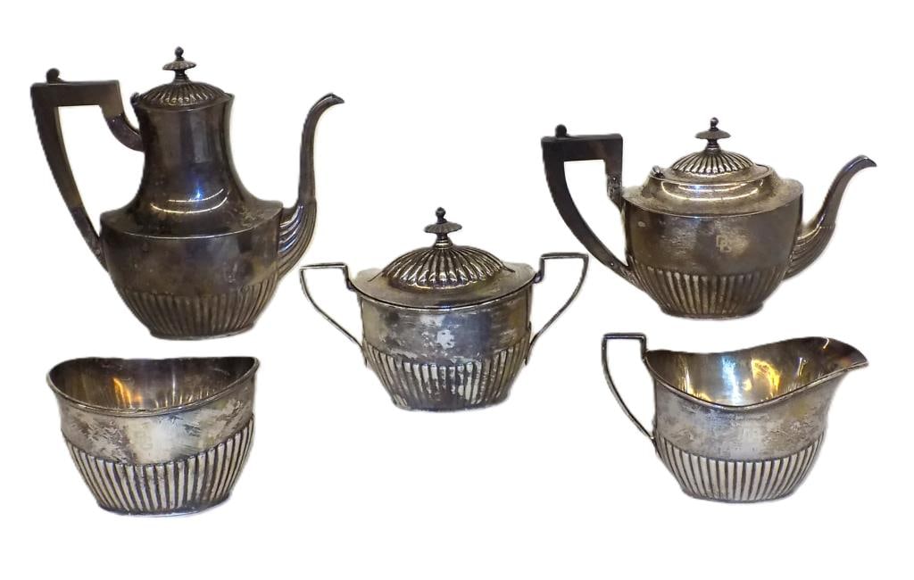 EARLY GORHAM 1853 STERLING SILVER COFFEE TEA SET: Early Gorham 1853 Sterling Silver Coffee & Tea Service Set. Rosewood Handles with Fluted Design. Complete Set Including Coffee Pot, Tea Pot, Lidded Sugar Vessel, Creamer, Waste Bowl. Lion, Anchor, G B