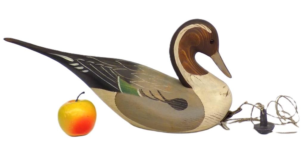 BIG SKY CARVERS FOLK ART CARVED DUCK DECOY: Big Sky Carvers Manhattan - Montana USA Hand Carved and Painted Wooden Duck Decoy with Attached Lead Sinker. Artist Signed A. Borgie ? Height 8" x Length 17"