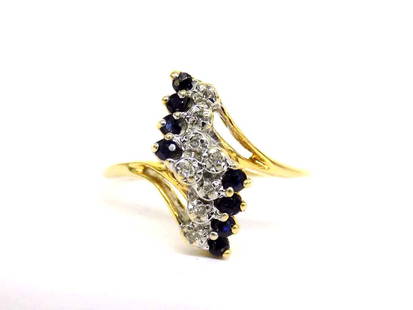 14K YELLOW GOLD DIAMOND BLUE SAPPHIRE RING: 14K Solid Yellow Gold Multi Diamond and Blue Sapphire Fashion Ring. Modern Design. Marked 14K FM ?