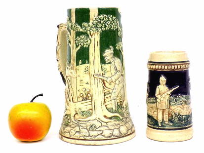 ANTIQUE GERMAN HUNTING BEER STEINS: Antique German Hunting Scene Beer Steins. Height 5" and 8". Minor wear.