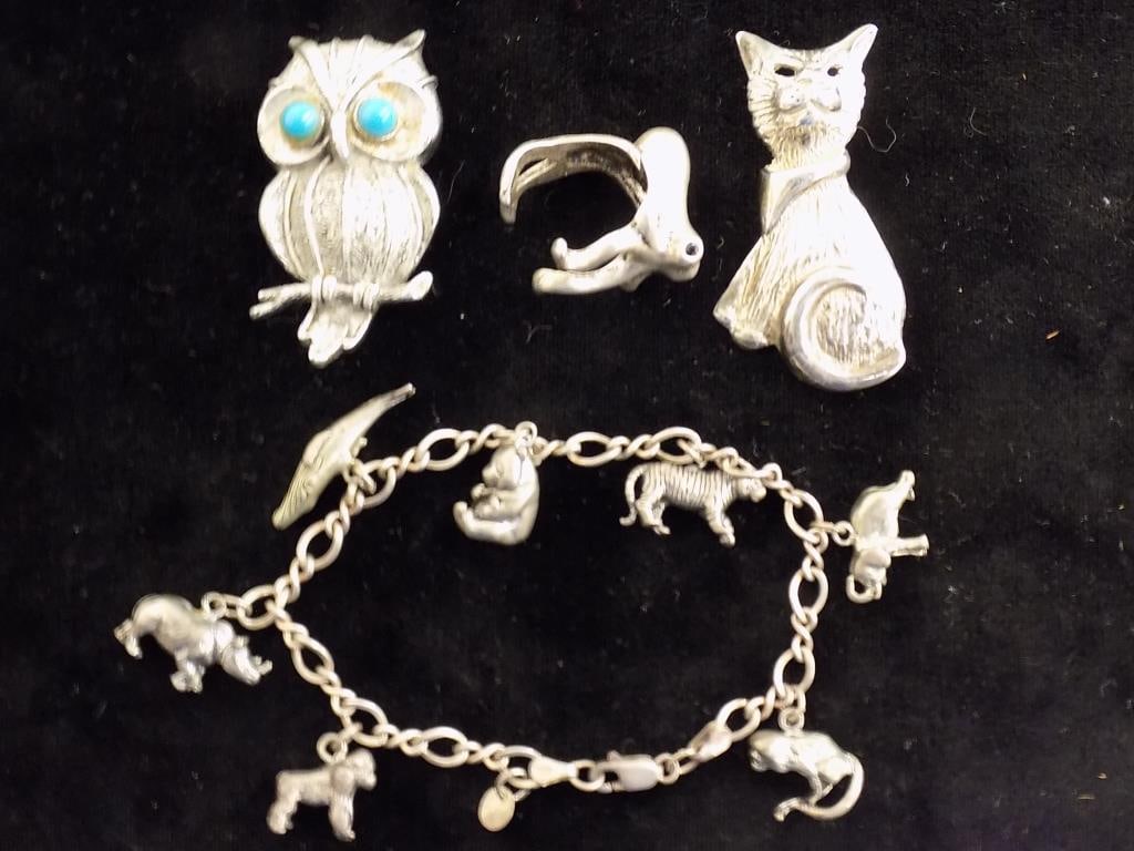 VINTAGE ANIMAL SILVER PINS RING CHARM BRACELET LOT: Vintage Animal Group of Silver Jewelry. Including Costume TT Signed Owl, Sterling Owl Artist Signed, Sterling Octopus Ring with Onyx Eyes, Sterling Charm Bracelet with Gorilla, Rhinoceros, Whale, Bear