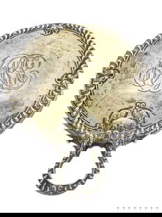 FANCY VICTORIAN GORHAM STERLING SILVER MIRROR: Antique Victorian Gorham Sterling Silver Handled Mirror. Fancy Gadrooned Border with Scrolled Shells. Stylized monogram. Height 8" x Diameter 6"