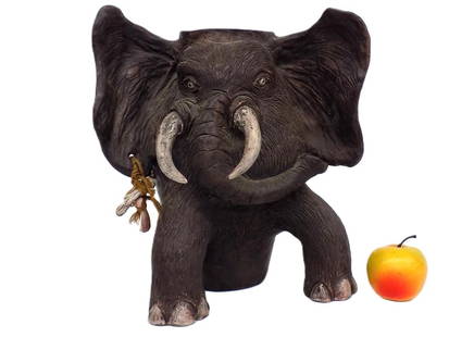 JOSEPH KURHAJEC BIG FOLK ART ELEPHANT CERAMIC VASE: Joseph Kurhajec American New York b. 1938 - Big Folk Art Ceramic Pottery Elephant Vase. Attached Ceramic Fetish Bones on Left Ear . Height 13" x Length Ear to Ear 12"