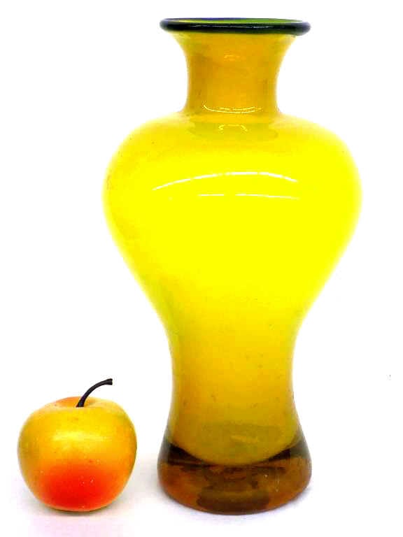 MIDCENTURY MODERN MURANO ART GLASS VASE: Midcentury Modern Italian Murano Art Glass Vase. Yellow with Blue Upper Rim and Amber Base. Hand Blown, Remnants of Maker Label. Height 10"