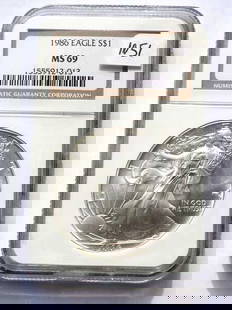 US MINT 1986 SILVER EAGLE DOLLAR NGC MS 69: United States Mint 1986 Silver Eagle $1 Dollar Coin. Walking Liberty Obverse, Heraldic Eagle Reverse. 1 Oz Fine Silver. NGC Sealed & Graded MS 69