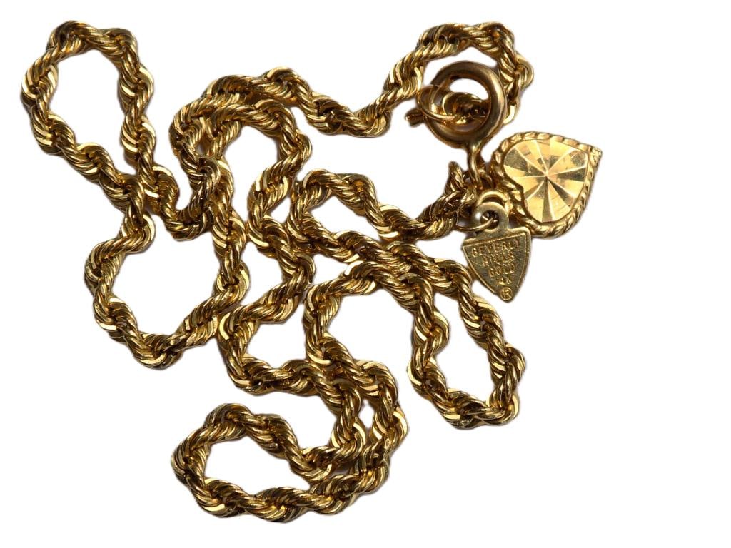 BEVERLY HILLS 14K GOLD ROPE BRAID BRACELET: Gorgeous Beverly Hills 14k Yellow Gold Bracelet. Braided Rope Design That Captures and Reflects Light. Dangling Heart Charm and Beverly Hills Gold Logo Attached. Length 10"