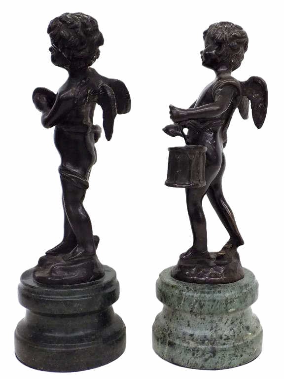 PAIR OF PUTTI ANGEL MUSICIANS BRONZE STATUES: Antique Pair of Winged Putti Angel Musicians Bronze Statues. One Playing a Drum, Another Playing Cymbals. Each on Green Marble Socles. Dark Patina. Total Height 11.50" x 4" x 4" and 11" x 4" x 4" 11
