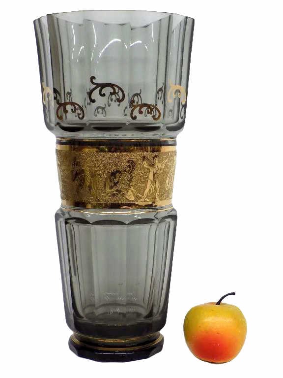 JOSEF HOFFMANN MOSER GOLD GLADIATOR GLASS VASE: Antique Moser Art Deco Smokey Art Glass Vase. Designed by Josef Hoffmann. Gold Gilt Scrollwork and Bands. Featuring Surrounding Center with Roman Gladiators Grasping Swords, Shields and Spears. Approx
