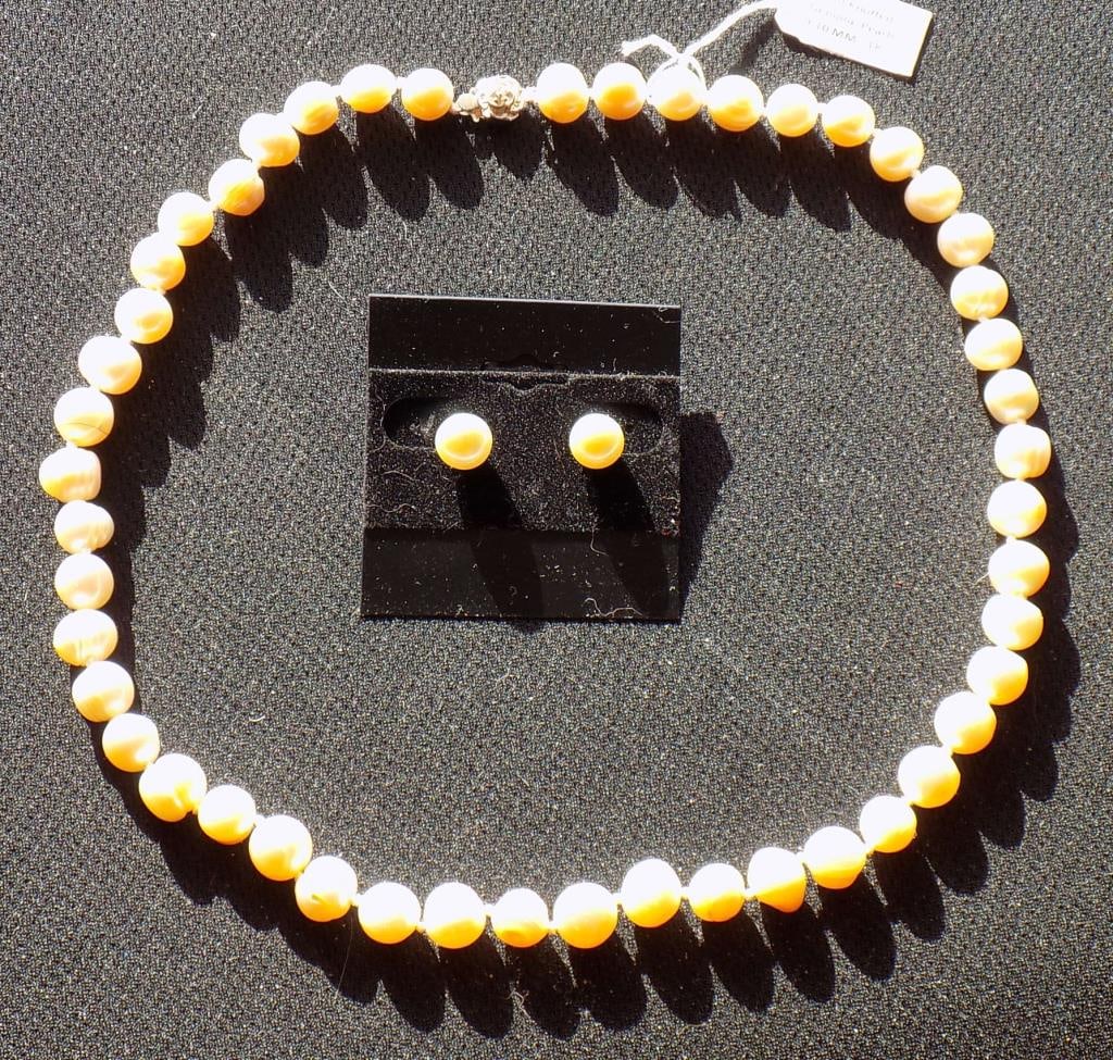 ELEGANT 18.50" WHITE PEARL NECKLACE & EARRING SET: Elegant 9-10 mm White Irridecent Pearl Necklace & 8 mm Earring Set. Sterling Silver Locking Clasp. Necklace Length 18.50"48 Individual Pearls