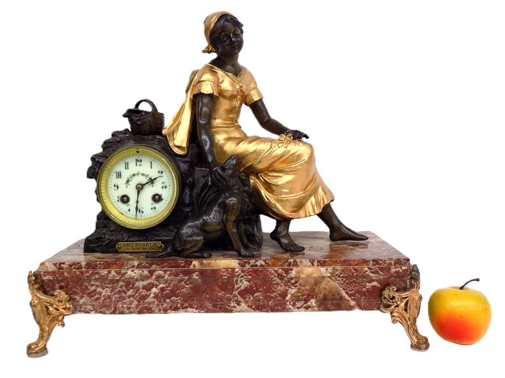 MOREAU - AMI FIDELE GILT BRONZED MANTEL CLOCK: Auguste Moreau - French 1834-1917 - Exceptional Victorian Mantel Clock Entitled Ami Fidele (Faithful Friend). Parel Gilt Bronzed Sculpture and Ormulu. Depicting a Seated Maiden with Dog on Rouge Marbl