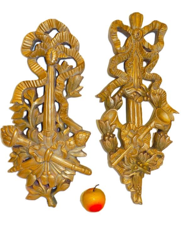 RENAISSANCE GILT WOOD TORCHIERE WALL CARVINGS: Antique Pair of Renaissance Form Gilt Wood Wall Carvings. Featuring Ribbons, Foilage and Crossed Torchieres. Height 21" x Width 2" x Length 11" 6 lbs