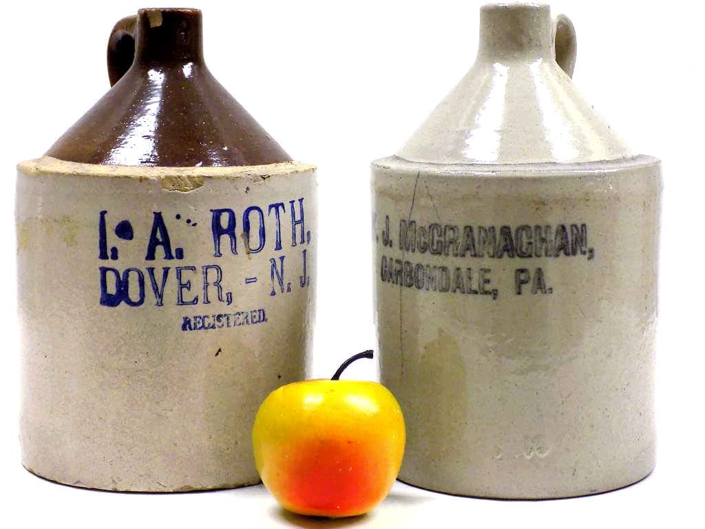 19TH CENTURY ADVERTISING STONEWARE WHISKEY JUGS: 19th Century Advertising Stoneware Whiskey Jugs. I.A. Roth Dover New Jersey and W.J. McCranaghan Carbondale PA Height 9"