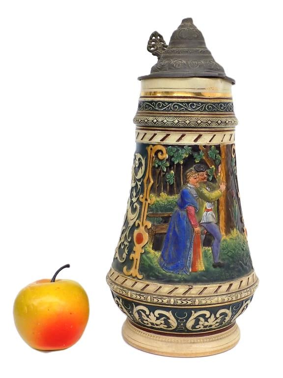 ANTIQUE GERMAN LOVERS BEER STEIN: Antique German Lovers Pottery Beer Stein. Detailed Multi Color Relief. Height 12" Very good, lid imperfections