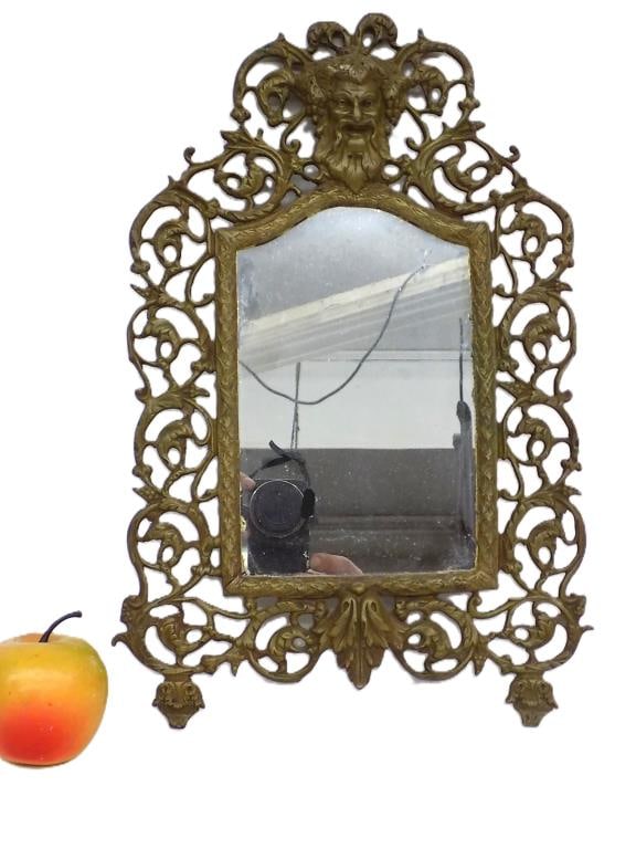 19TH CENTURY RENAISSANCE REVIVAL BRONZE MIRROR: 19th Century Renaissance Revival Gilt Bronze Frame with Mirror. Featuring a Bacchus Head Medallion Surrounded by Grapevines and Acanthus. 15" x 1" x 10" 3 lbs