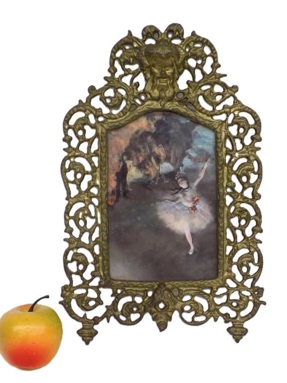 19TH CENTURY RENAISSANCE REVIVAL BRONZE FRAME: 19th Century Renaissance Revival Gilt Bronze Frame with Mirror. Featuring a Bacchus Head Medallion Surrounded by Grapevines and Acanthus. 13" x 1" x 9" 2 lbs