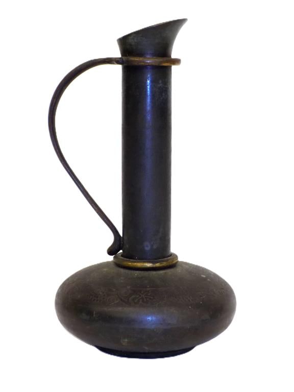 MIDCENTURY PAL BELL CO BRONZE WINE EWER: Midcentury Pal Bell Co Ltd Israel Bronze Wine Ewer. Maurice Ascalon Designed Form with Surrounding Grapevines. Parcel Gilt Handle. Signed Base. Height 10" x 5.50" x 5.50" 3 lbs