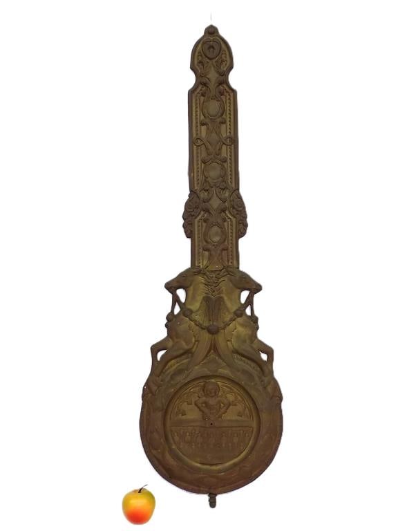 BIG 1800'S WINGED HORSES GILT CLOCK PENDULUM: Big 19th Century Repousse Gilt Metal Clock Pendulum. Decorated with Winged Horses Above a Boy on a Balcony with Floral Backgrounds. Height 40" x 1" x 12" 2 lbs Likely to a French or German Tall case c