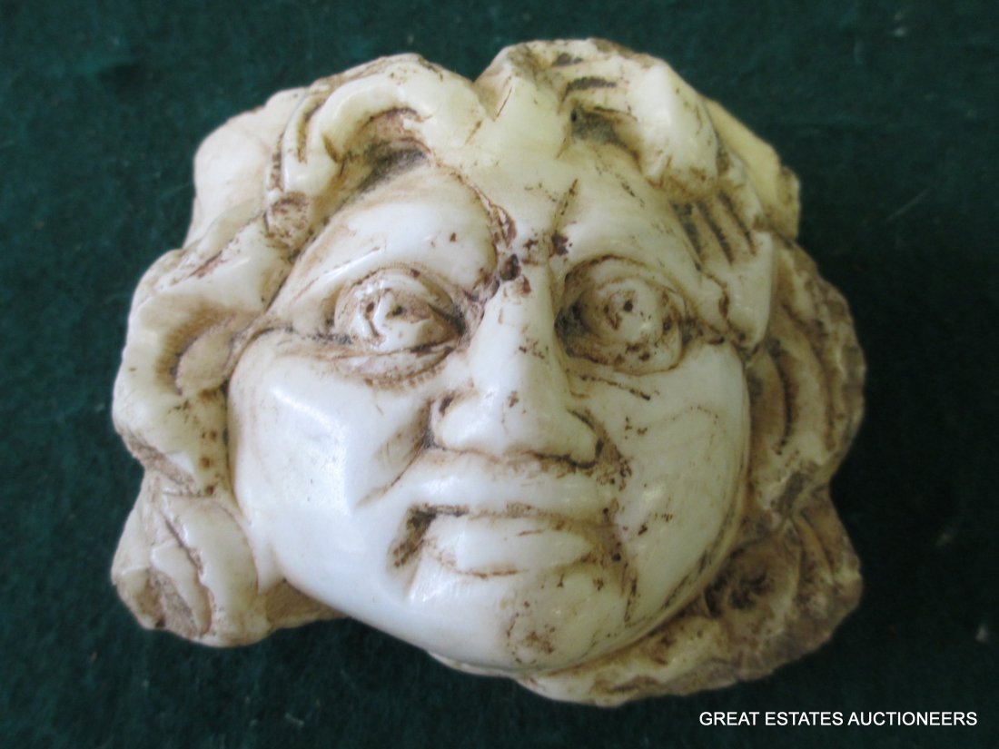 ROMAN CARVED MEDUSA HEAD RELIEF ANTIQUITY: Roman antiquity of a medusa head, apparently white marble,carved and polished fragmentary relief. Excavated Syria, est. 200-400 A.D . H 3.50" x L 4"