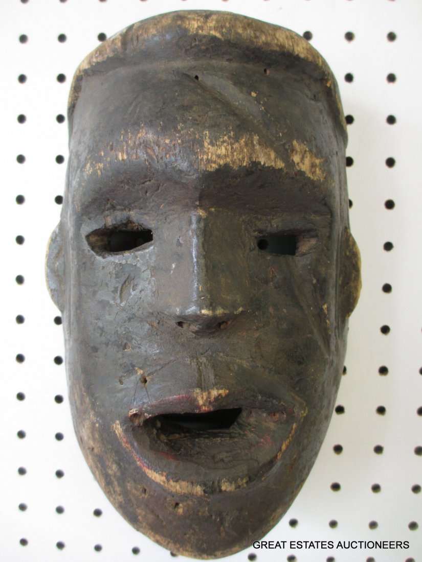 EARLY CONGOLESE CARVED TRIBAL MASK: An early 19th Century Congolese mask, unknown tribe, as it was not found in collectors cataloging, showing much tribal use . H 9.50