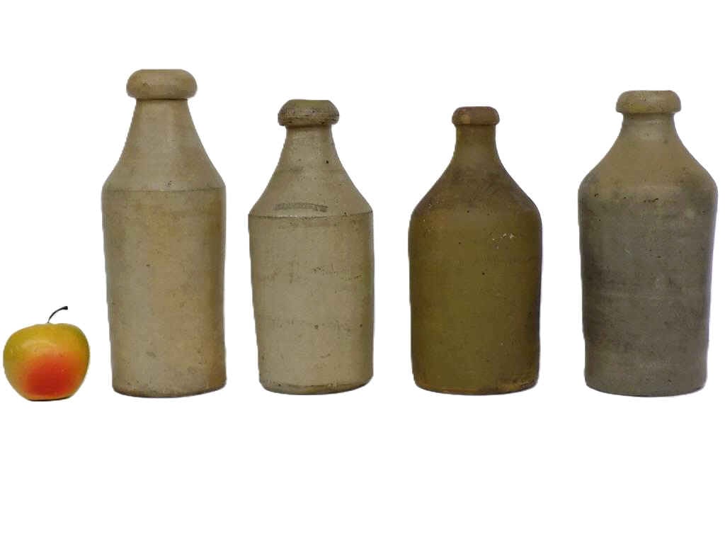 19TH CENTURY STONEWARE BEER BOTTLES FREILEWEH: 4 19th Century Primitive Glazed Stoneware Beer Bottles. Including M. Freileweh Height 9.25" x 3.50" x 3.50" and 10.50" x 3 3/4" x 3 3/4" 10 lbs