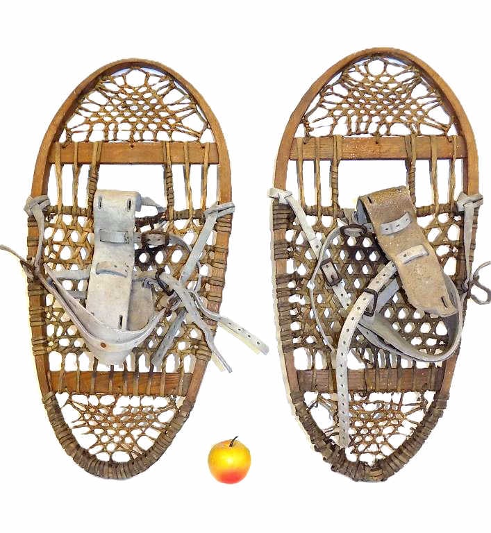 VINTAGE PAIR OF FABER ADIRONDACK SNOW SHOES 26": Vintage Pair of Faber Brand Adirondack Snow Shoes. Decals worn off. Raw Hide Netting and Leather Foot Straps. Great Rustic Home or Cabin Decor. Each Measures 26" x 1" x 12.5" 4.5 lbs has wear