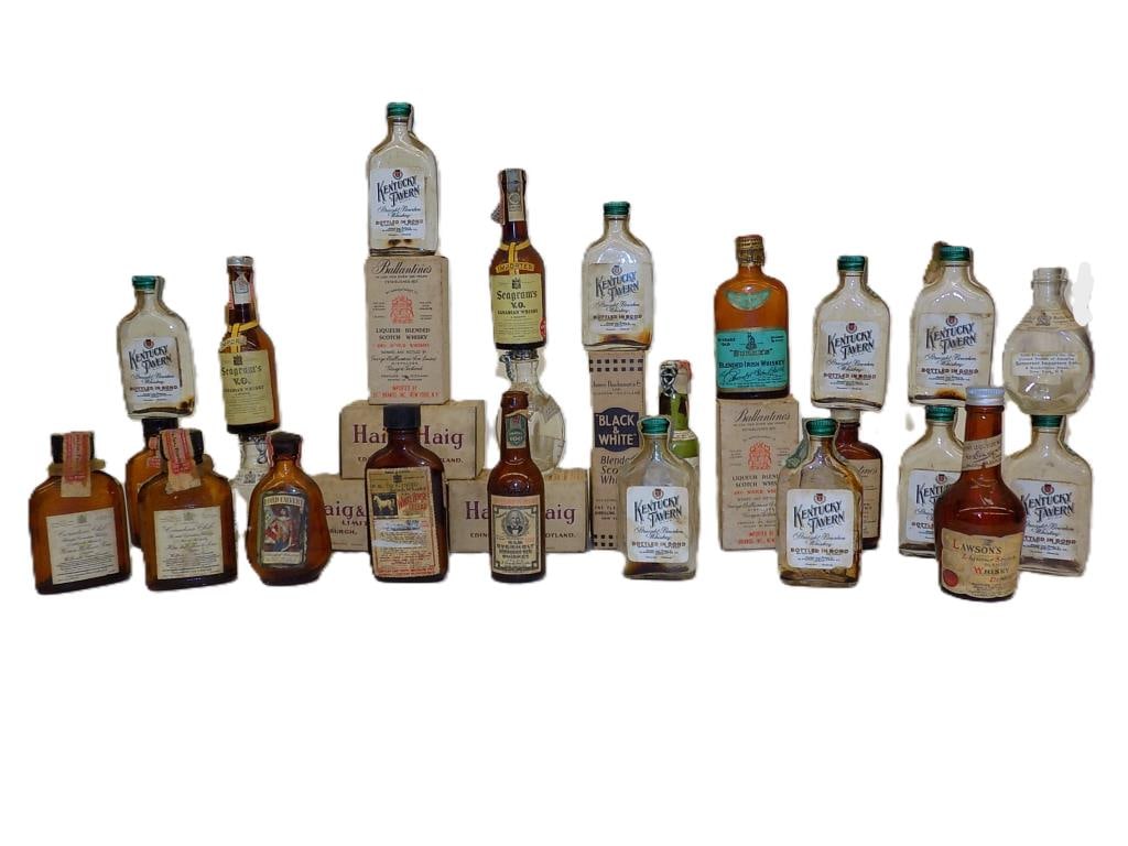 ANTIQUE ADVERTISING WHISKEY BOTTLES GROUP: Large Lot of 28 Antique Advertising Travel Size Whiskey Bottles. Including 9 Kentucky Tavern, 3 Canadian Club, 5 Haig & Haig Scotland, 1 Black & White, 3 Ballantines, 1 Burkes, 1 White Horse Cellar, 1