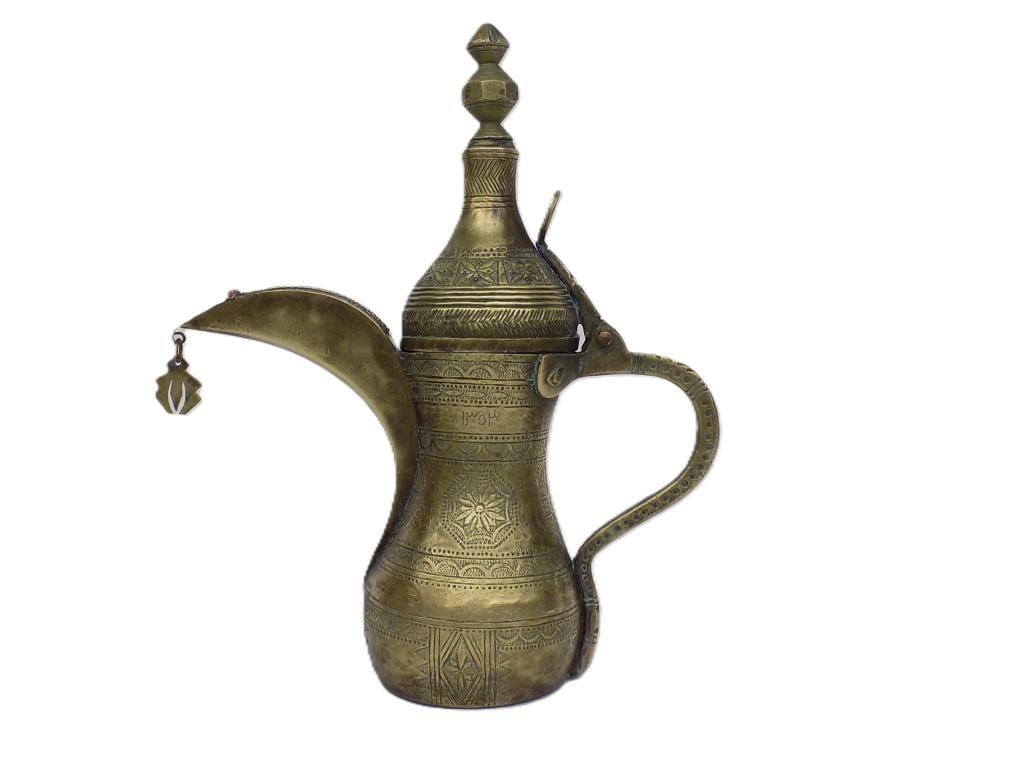 IMPORTANT ARABIAN GOLDEN DALLAH SIGNED COFFEE POT: Fine Arabian Golden Brass Dallah Coffee Pot. Extraordinary Hammering and Engraving Throughout, Hand Made. Signed and Dated Amal Qasim in Persian Islamic writing 9.50" x 3 x 8" 1 lb Provenance: From Th