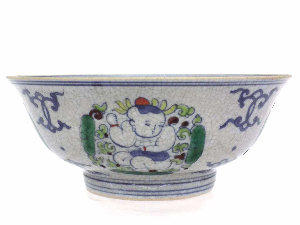 CHINESE WUCAI BOY PALACE BOWL CHENGUA MARK: Chinese Wucai Porcelain Palace Bowl. Surrounding Decoration of a Boy and Clouds. Hand Painted. Chengua Underglaze Mark. Age Craquelure Height 3" x 7.25" x 7.25"