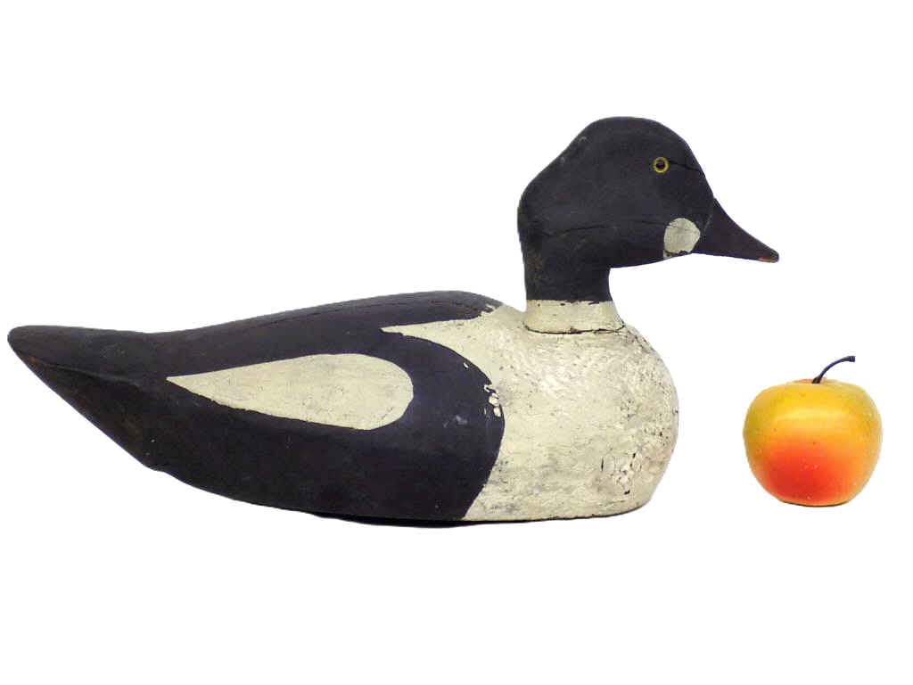PRIMITIVE HUDSON VALLEY FOLK ART WOODEN DUCK DECOY: Primitive Hudson Valley Folk Art Wooden Long Bill Duck Decoy. Hand Carved and Painted Dark Oak. Glass eyes. Height 7.50" x 5" x 17" 2 lbs. Great Original Surface Patina, natural age split