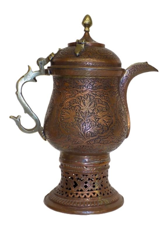 ELABORATE PERSIAN COPPER BRASS COFFEE POT: Antique Persian Brass and Copper Coffee Pot. Elaborately Chased and Engraved with Floral Decoration. Illegible Maker Base Mark11.50" x 5" x 9.50" 4 lbs Provenance: From The Estate of a Late World Trav
