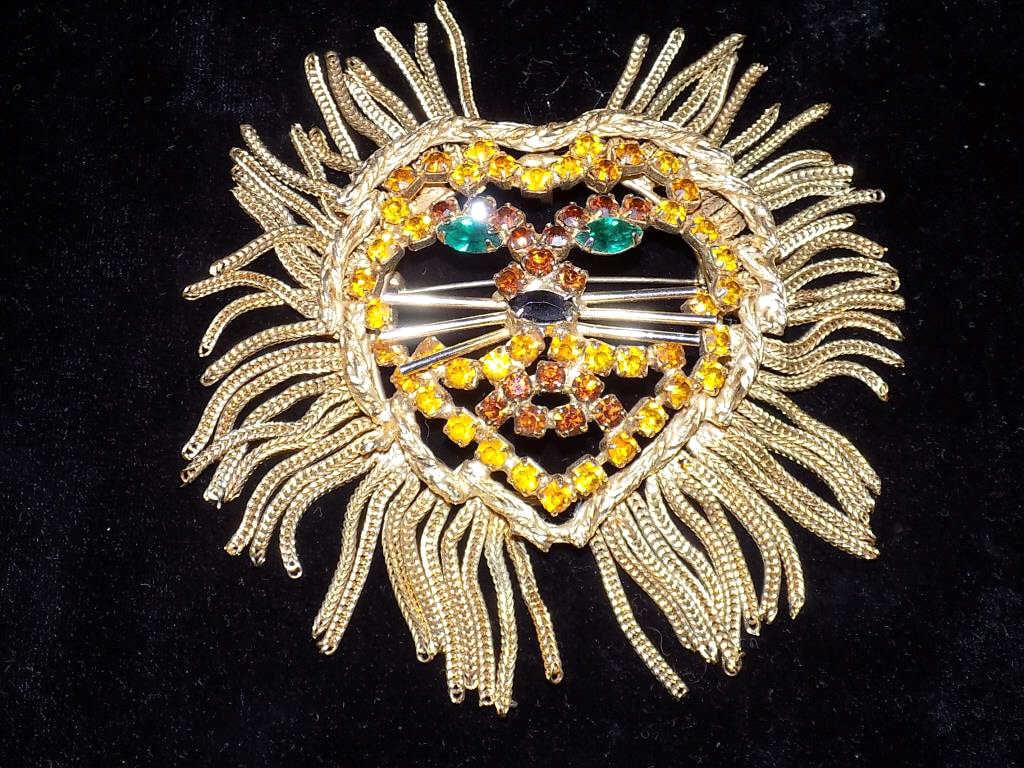 FABULOUS GOLD TONE RHINESTONE LION BROOCH: Fabulous Midcentury Fashion Designer Brooch. Gold Tone with Flexible Tassle and Emerald, Citrine & Garnet Color Rhinestones. 4" x 3" From A Prominent New York Estate Collection