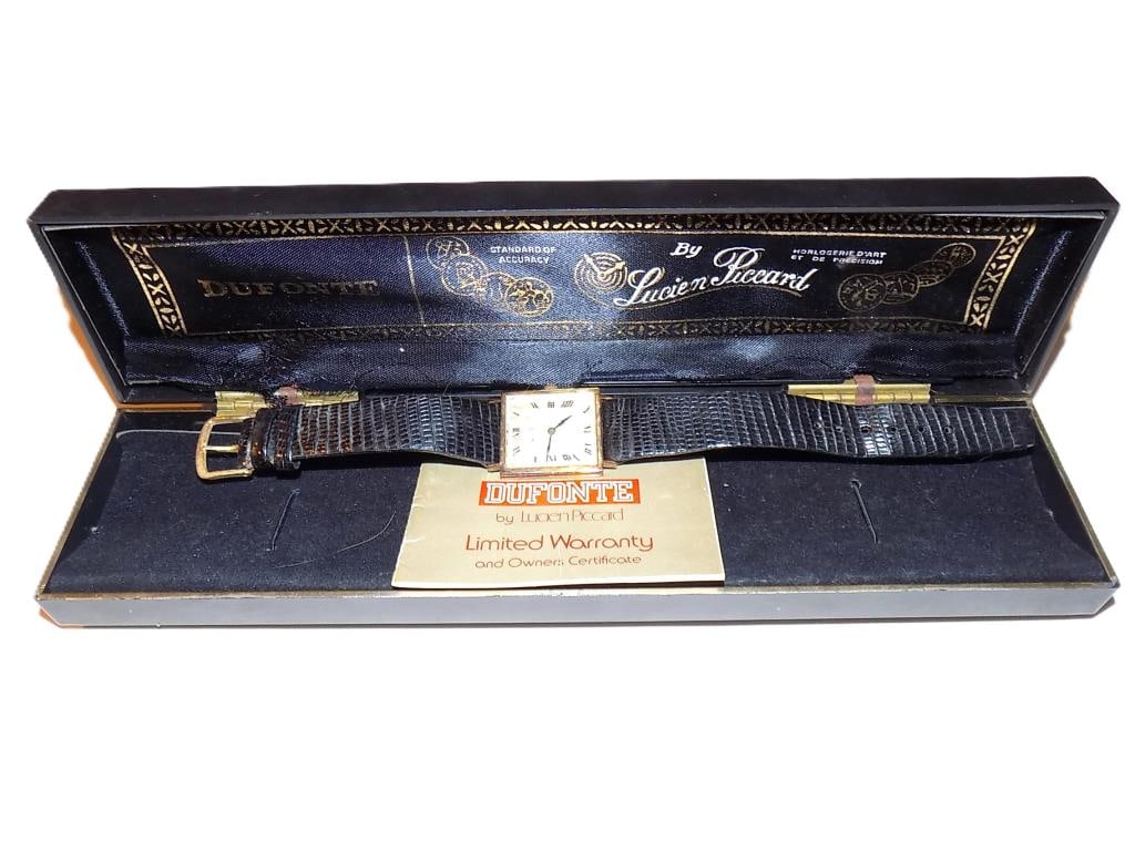 LUCIEN PICCARD DUFONTE 18K GOLD WRISTWATCH 22.5 G: Vintage Lucien Piccard Dufonte Solid 18K Gold Wristwatch. Self Winding Movement. Roman Numeral Dial. Kreisler Leather Strap with Buckle. Original Box and Papers. Length 8.50" 22.5 Grams tw Tests 18K G