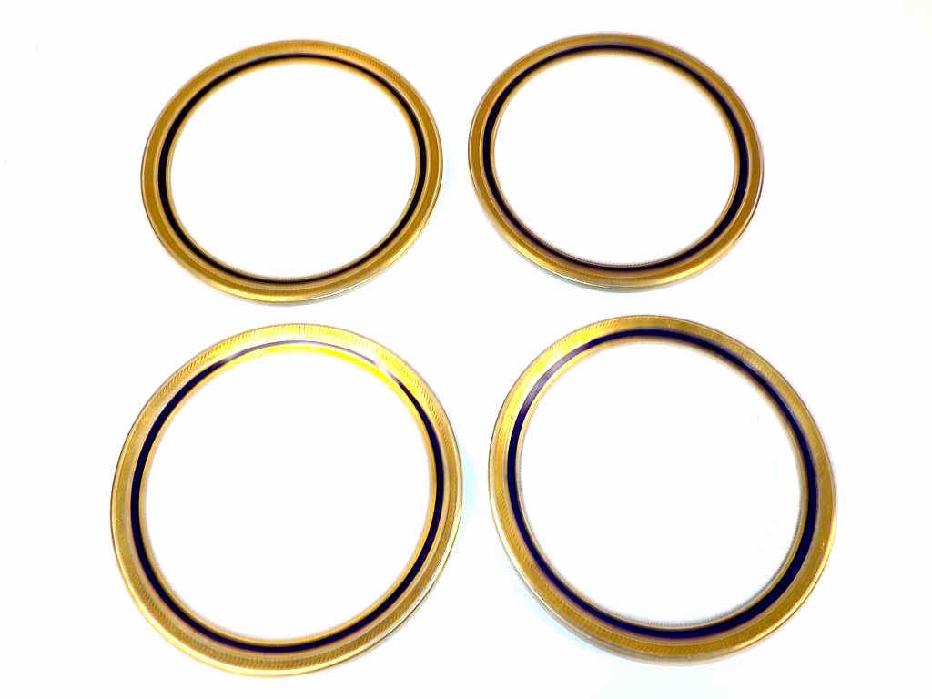 ROYAL CAULDON GOLD COBALT DESSERT PLATES: Higgins and Seiter New York City Retailed Set of 4 Royal Cauldon Porcelain Dessert Plates. Gold Plated Laurel and Cobalt Borders. Diameter 8.50"