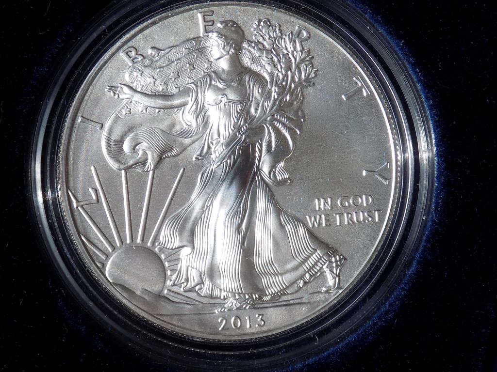 US MINT 2013 AMERICAN EAGLE SILVER COIN UNC: United States West Point Mint 2013 American Eagle $1 One Dollar Uncirculated Silver Coin. Walking Liberty Obverse by Adolph Weinman, Heraldic Eagle Reverse By John Mercanti. 1 Oz Fine Silver with Blue
