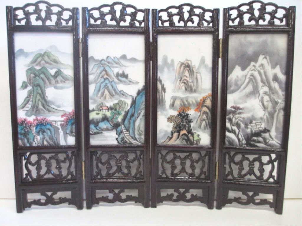 CHINESE SCENIC PORCELAIN TABLE SCREEN: Chinese painted porcelain 4 piece panel table screen . Standing cranes on 1 side , mountain landscapes on the other. H 10 3/4" . W 13 3/4 ". Panels 5 1/2" x 3".