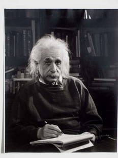 PHILIPPE HALSMAN - ALBERT EINSTEIN PHOTOGRAPH: Gelatin silver print Numbered 163/500 Embossed signature lower right Halsman hand stamp with pencil signed title date en verso Image: 13.5 x 10.75 inches; Sheet: 14 x 11 inches; Framed: 19 3/4 x 17 in